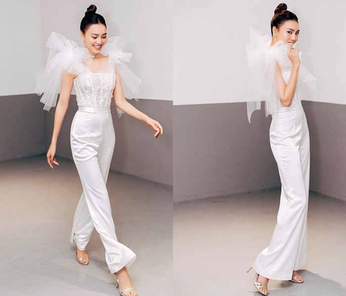 Ninh Dương Lan Ngọc phô diễn thân hình hoàn hảo trong bộ jumpsuit trắng, chất liệu xuyên thấu phần thân áo khiến nữ diễn viên gợi cảm hơn.