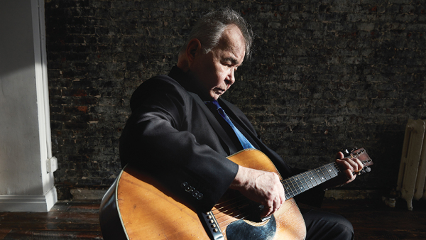 Âm nhạc của John Prine được khen vì lời ca sâu sắc.