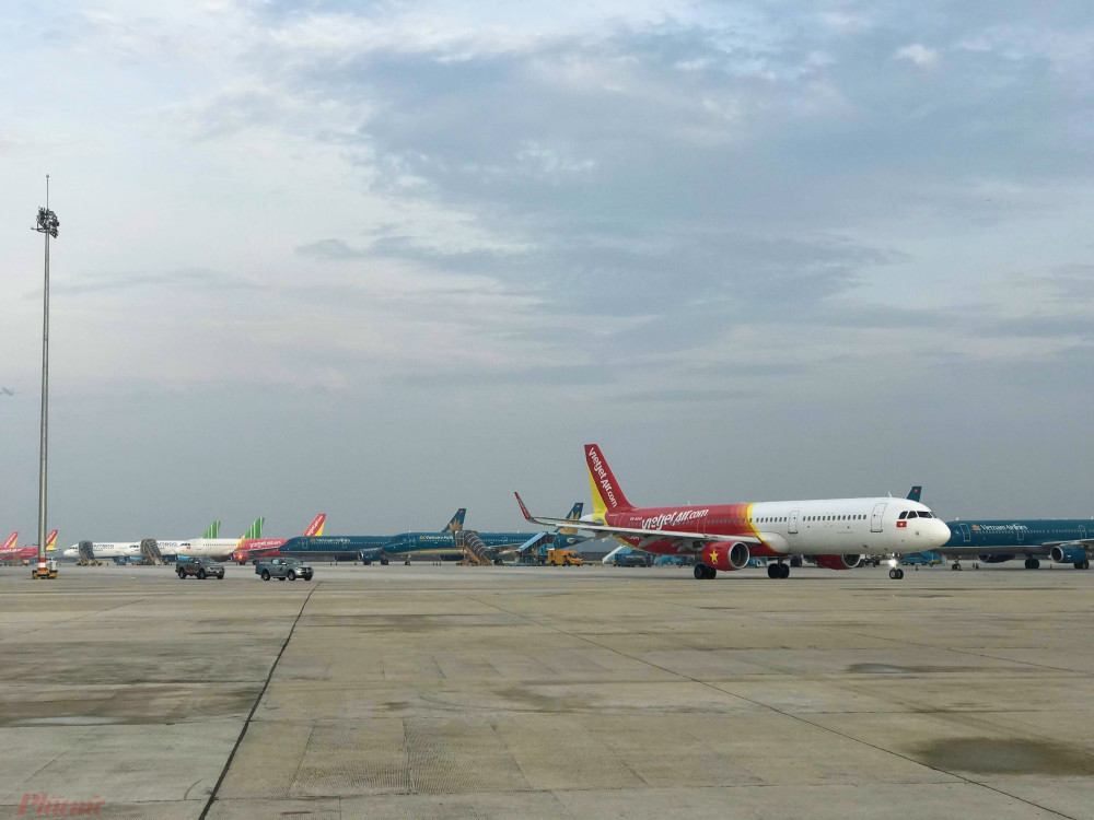 Từ đầu tháng 7, nhiều chuyến bay của các hãng hàng không ở tại hai Cảng lớn là TPHCM và Hà Nội luôn trong tình trạng ùn tắc vì nâng cấp hạ tầng. Ảnh: Quốc Thái