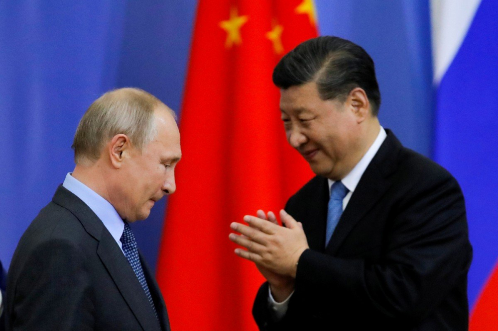 Tổng thống Nga Vladimir Putin và Chủ tịch Trung Quốc Tập Cận Bình - Ảnh: Reuters