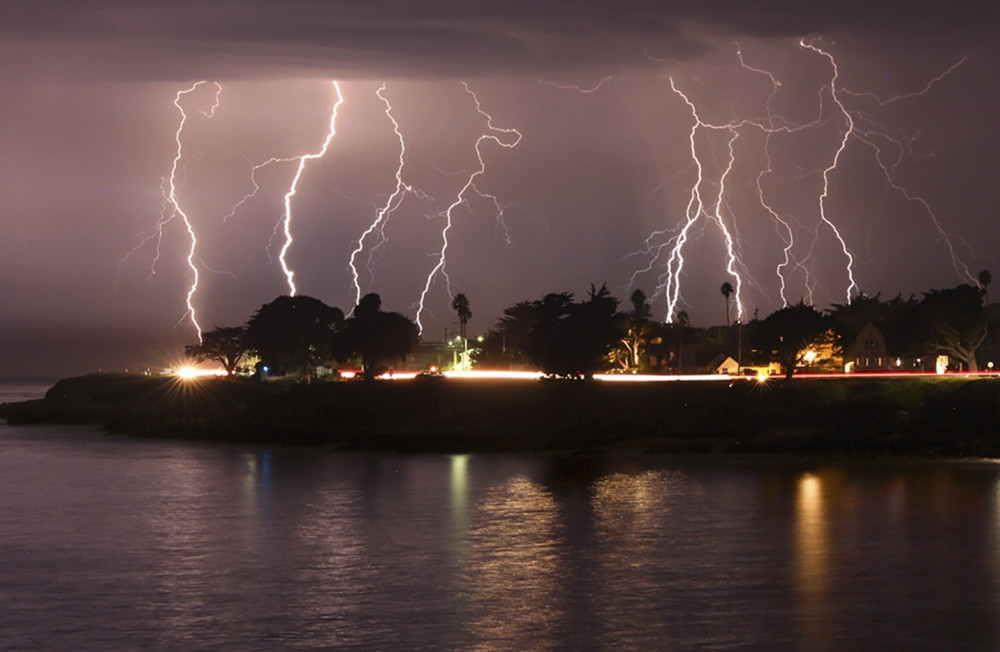 lightning storm crackles over Mitchell's Cove in Santa Cruz around 3 a.m. Sunday. Photo by Shmuel Thaler, The Santa Cruz Sentinel via AP