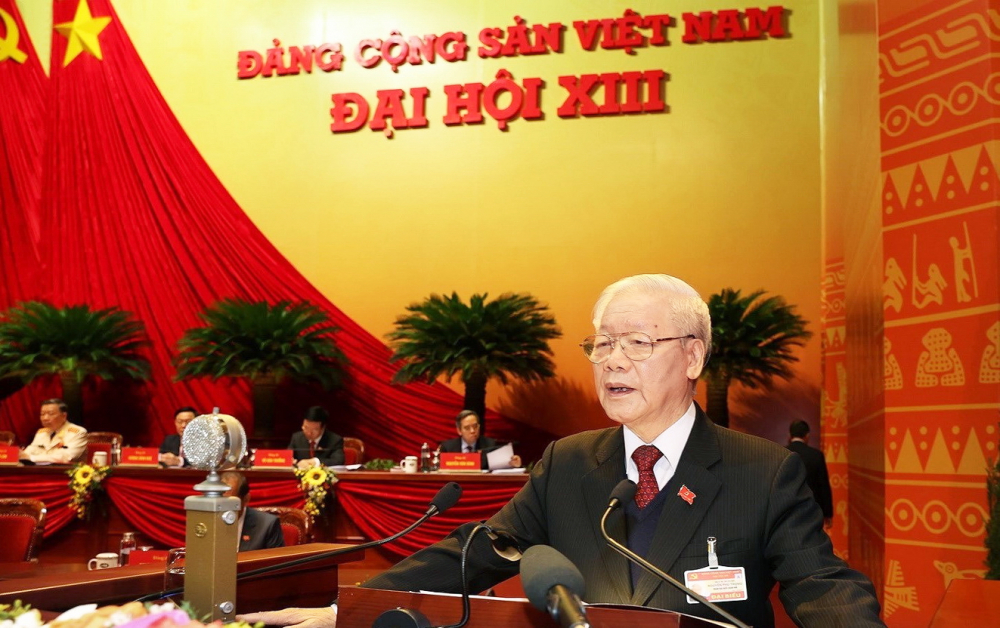 Tổng bí thư, Chủ tịch nước Nguyễn Phú Trọng - Trưởng tiểu ban Văn kiện đã trình bày báo cáo của Ban Chấp hành Trung ương khóa XII