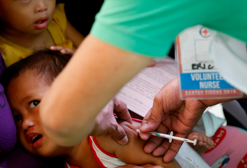 Các chương trình tiêm vắc-xin đã giúp cứu sống hàng triệu trẻ em ở các nước nghèo trên khắp thế giới - Ảnh: 