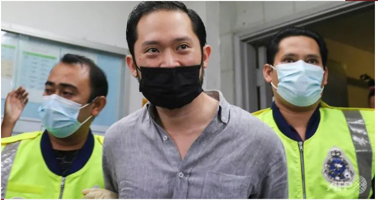 Cảnh sát hộ tống Chan Eu Boon, người sáng lập trang web hẹn hò Sugarbook, đến tòa án ở Shah Alam, ngoại ô Kuala Lumpur