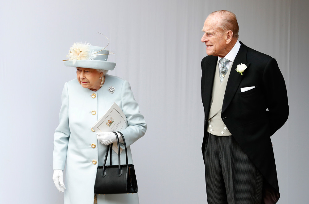 Nữ hoàng Anh Elizabeth II và chồng mình, Hoàng thân Philip - Ảnh: Alastair Grant/AFP/Getty Images