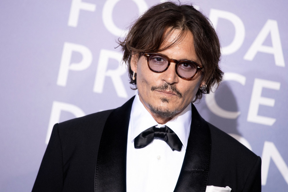 Johnny Depp thua kiện vợ cũ tội bạo hành.