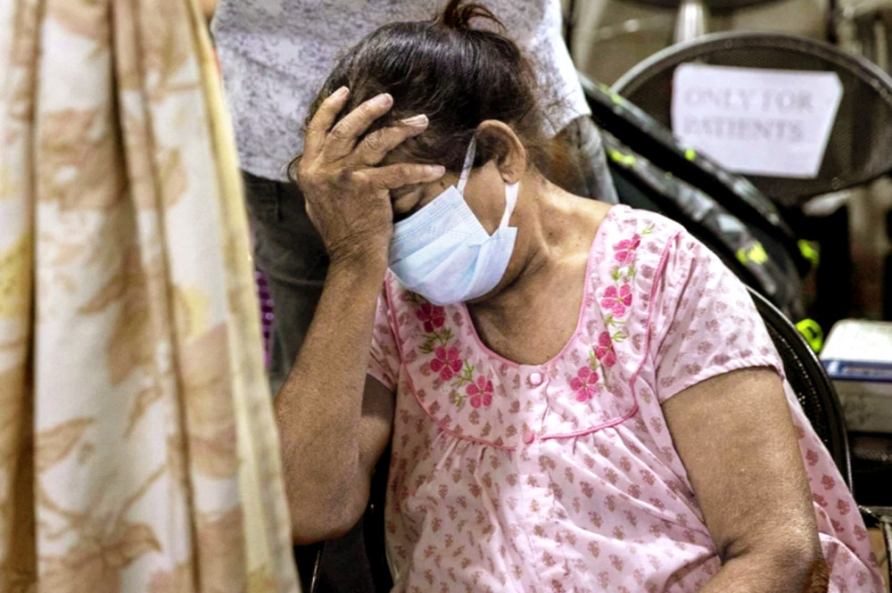 Tình trạng dịch bệnh ở Ấn Độ đang gây ra những chấn thương tâm lý cho nhiều người dân nước này - Ảnh: Reuters
