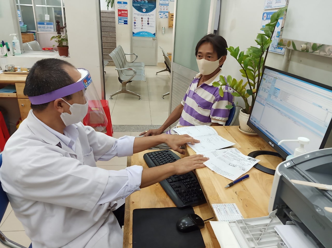 Bệnh nhân khám bệnh tại Bệnh viện TP.Thủ Đức - Ảnh: Hiếu Nguyễn
