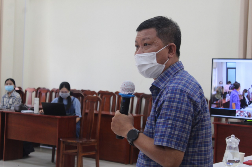 Phó Chủ tịch Thường trực Liên đoàn Lao động TPHCM Trần Đoàn Trung nêu các vấn đề thực tiễn trong việc triển khai chính sách hỗ trợ người lao động bị ảnh hưởng bởi dịch COVID-19.