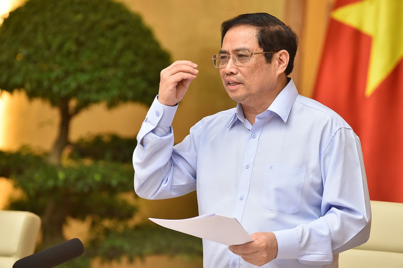 Thủ tướng Phạm Minh Chính vừa ký ban hành Nghị quyết số 86/NQ-CP về các giải pháp cấp bách phòng, chống dịch bệnh COVID-19 . Ảnh: VGP