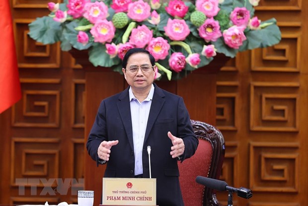 Thủ tướng Phạm Minh Chính chia sẻ với những khó khăn, mất mát của nhân dân đang chịu ảnh hưởng của bão lũ. (Ảnh: Dương Giang/TTXVN)