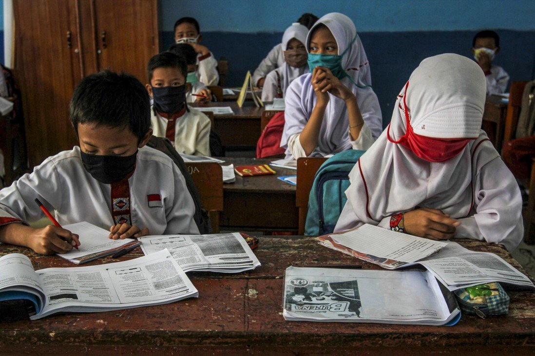 Học sinh Indonesia tại một lớp học ở Palembang, Nam Sumatra - Ảnh: AFP