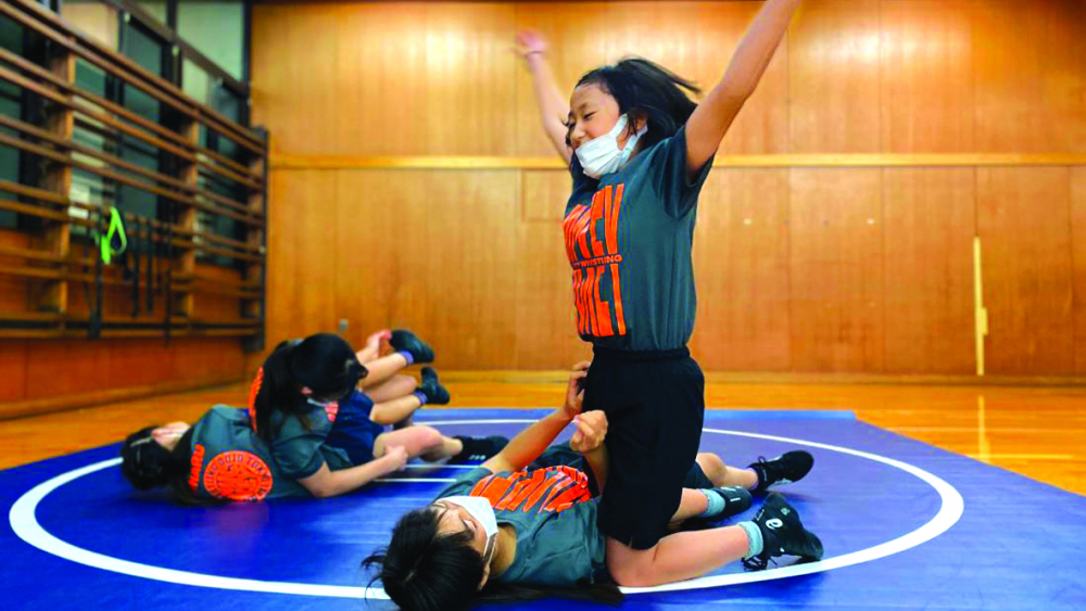 Các thí sinh trong giải đấu dành cho nữ sinh tiểu học quốc gia Wanpaku cũng đi lên từ môn judo và đấu vật - ẢNH: CNN
