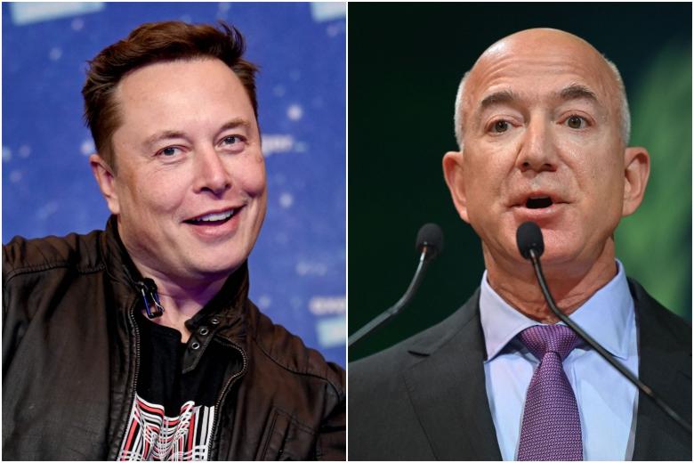 Giám đốc Tesla và SpaceX, Elon Musk (trái) và Jeff Bezos của Amazon là một trong những người đàn ông giàu nhất thế giới ẢNH: AFP