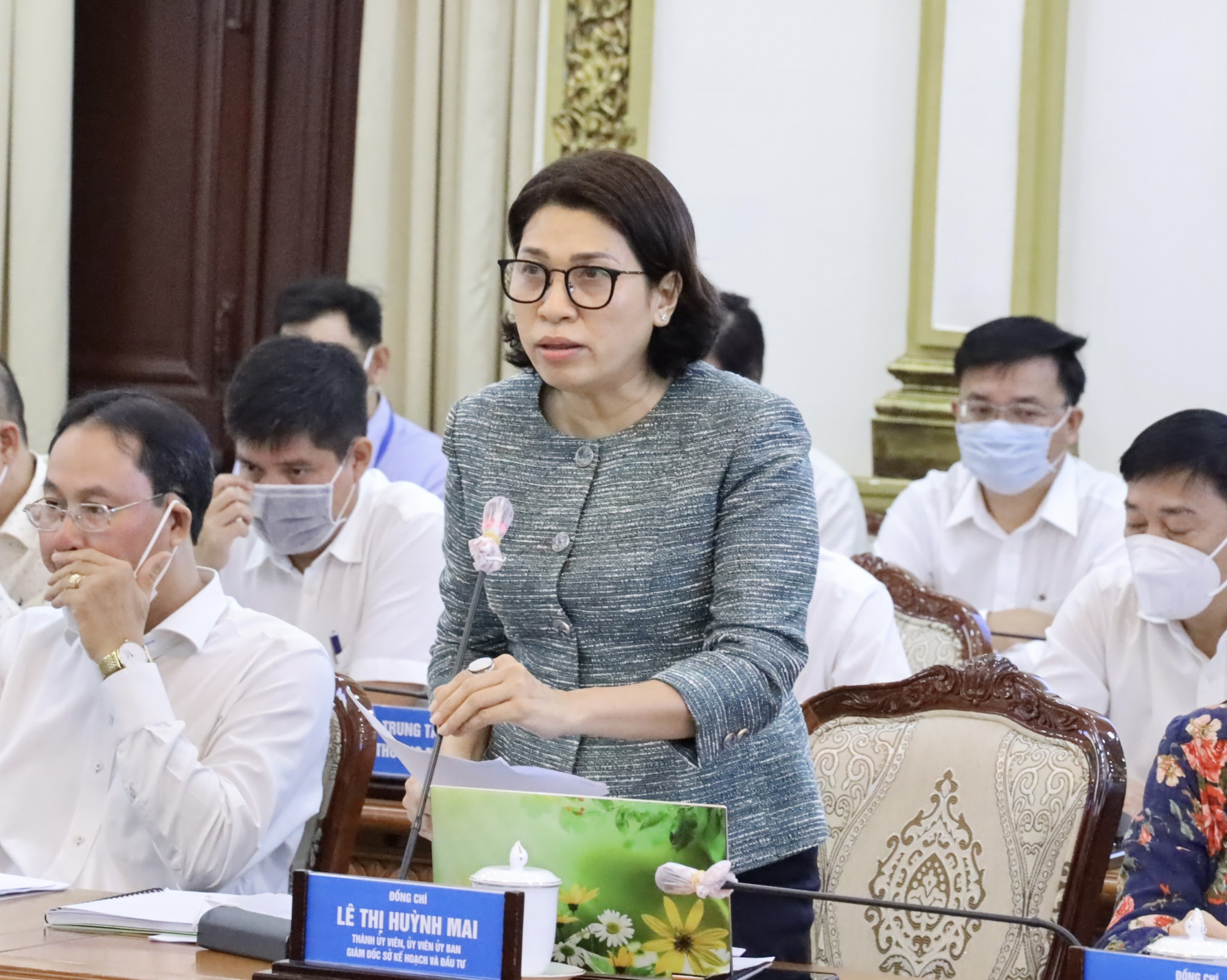 Bà Lê Thị Huỳnh Mai - giám đốc Sở Kế hoạch - Đầu tư TPHCM báo cáo tại cuộc họp
