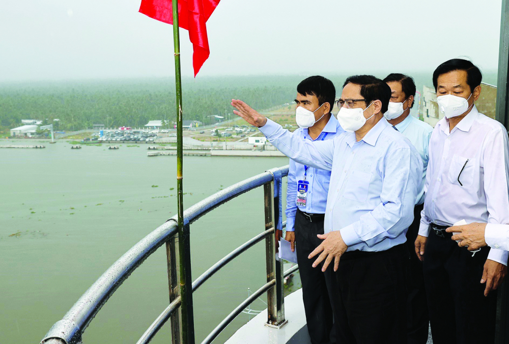 Chiều 5/3/2022, tại H.Châu Thành, tỉnh Kiên Giang, Thủ tướng Phạm Minh Chính dự khánh thành hệ thố ng công trì nh thủ y lợ i Cá i Lớ n - Cá i Bé giai đoạn 1. Đây là công trình thủy lợi lớn nhất Việt Nam về quy mô, khẩu độ thông nước; công trình này được kỳ vọng sẽ góp phần thúc đẩy sự phát triển của đồng bằng sông Cửu Long ẢNH: DƯƠNG GIANG-TTXVN