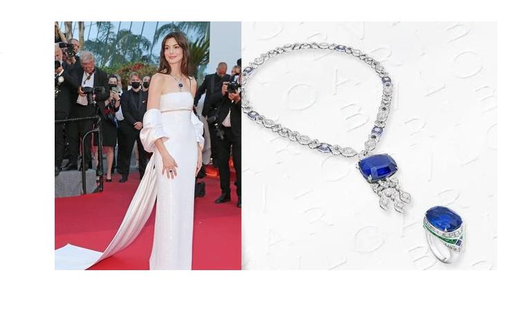 Vẻ ngoài cuốn hút của Anne Hathaway được coi là một trong những nữ hoàng thảm đỏ Cannes 2022. Hãy lựa chọn chiếc váy trắng lệch vai quyến rũ kết hợp vòng cổ Địa Trung Hải của thương hiệu cao cấp Bulgari với một viên sapphire khổng lồ nhiều lớp màu xanh hoàng gia tuyệt đẹp nặng tới 107,15 carat - một những sáng tạo nổi bật từ bộ sưu tập trang sức cao cấp của Bulgari Eden The Garden of Wonders - khiến cô ấy trông như một nàng công chúa. 