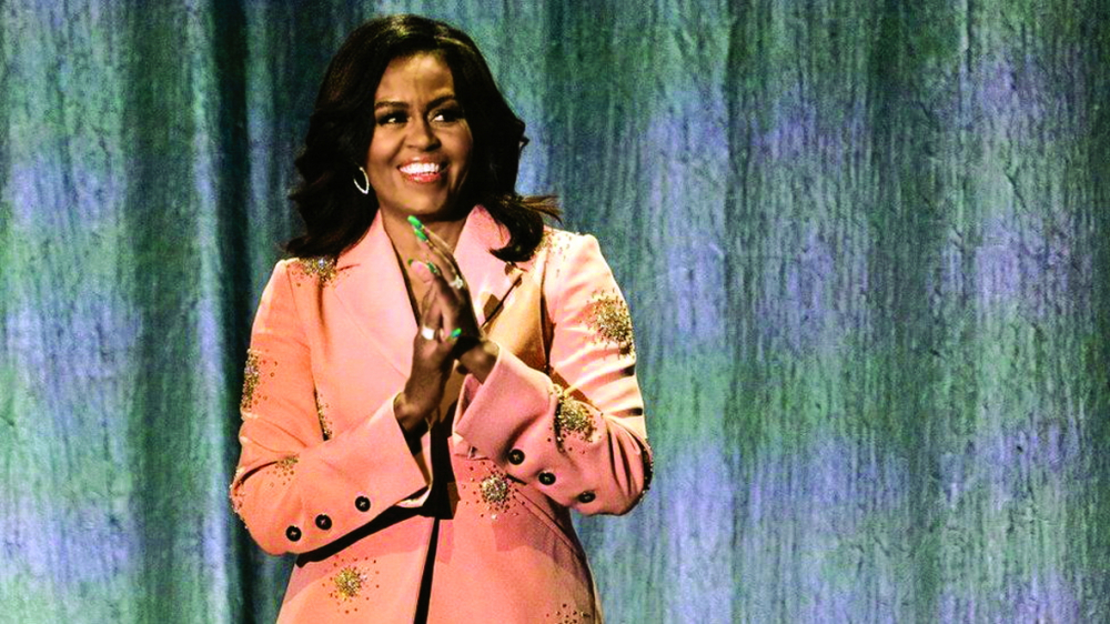 Bà Michelle Obama cố gắng làm việc chăm chỉ hơn để khắc phục hội chứng kẻ mạo danh - ẢNH: BBC
