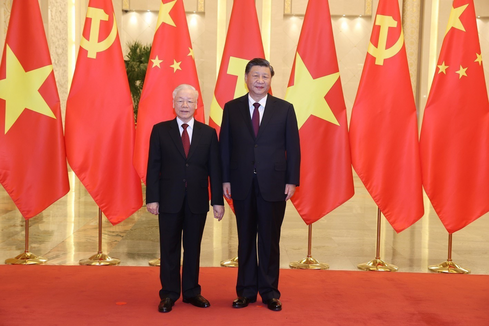 Tổng Bí thư Nguyễn Phú Trọng và Tổng Bí thư, Chủ tịch Trung Quốc Tập Cận Bình chụp ảnh chung.