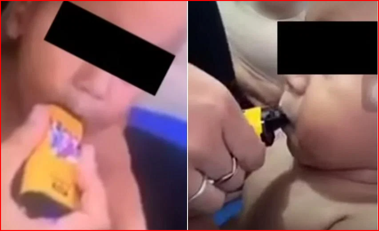 Đoạn clip trên Facebook cho thấy em bé bị buộc phải hít khói, trong khi mẹ em thích thú chứng kiến. ẢNH: MÀN HÌNH TỪ 7NEWS AUSTRALIA/YOUTUBE