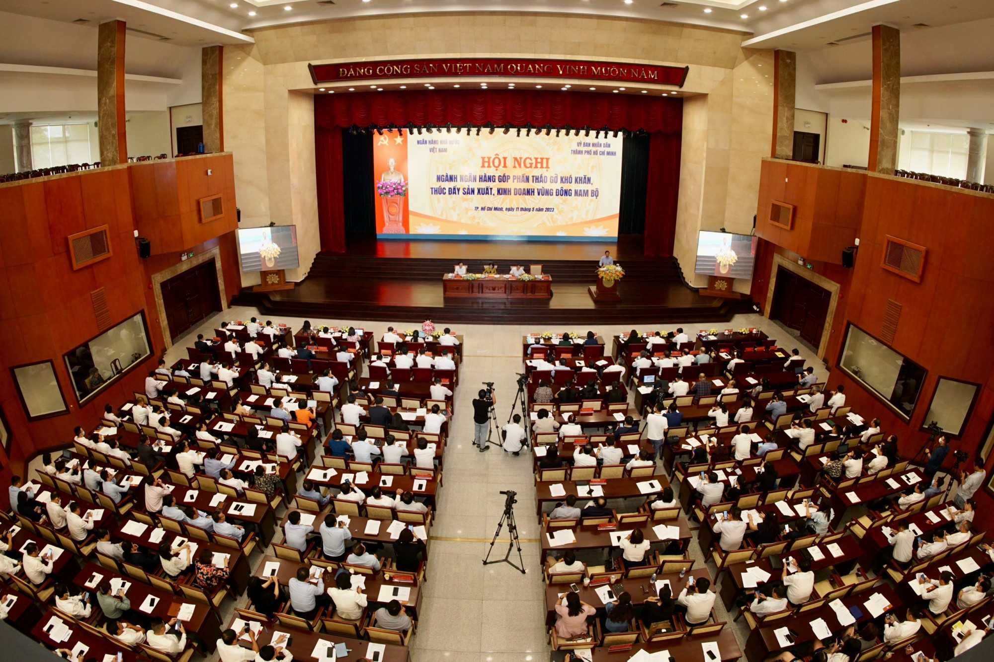 Hội nghị giải pháp tín dụng thúc đẩy sản xuất, kinh doanh vùng Đông Nam Bộ diễn ra tại TPHCM chiều 11/5.