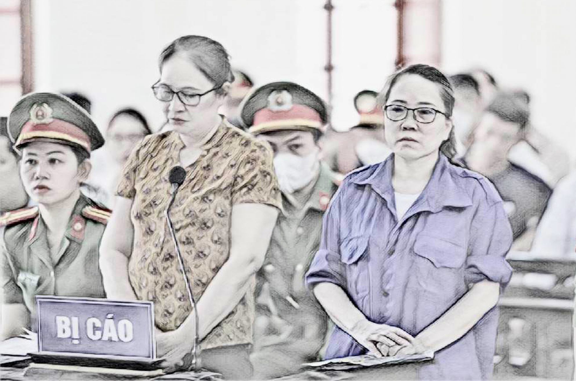 Bị cáo Lê Thị Dung (bên phải) và bị cáo Nguyễn Thị Hương tại phiên tòa - Ảnh: Khánh Trung