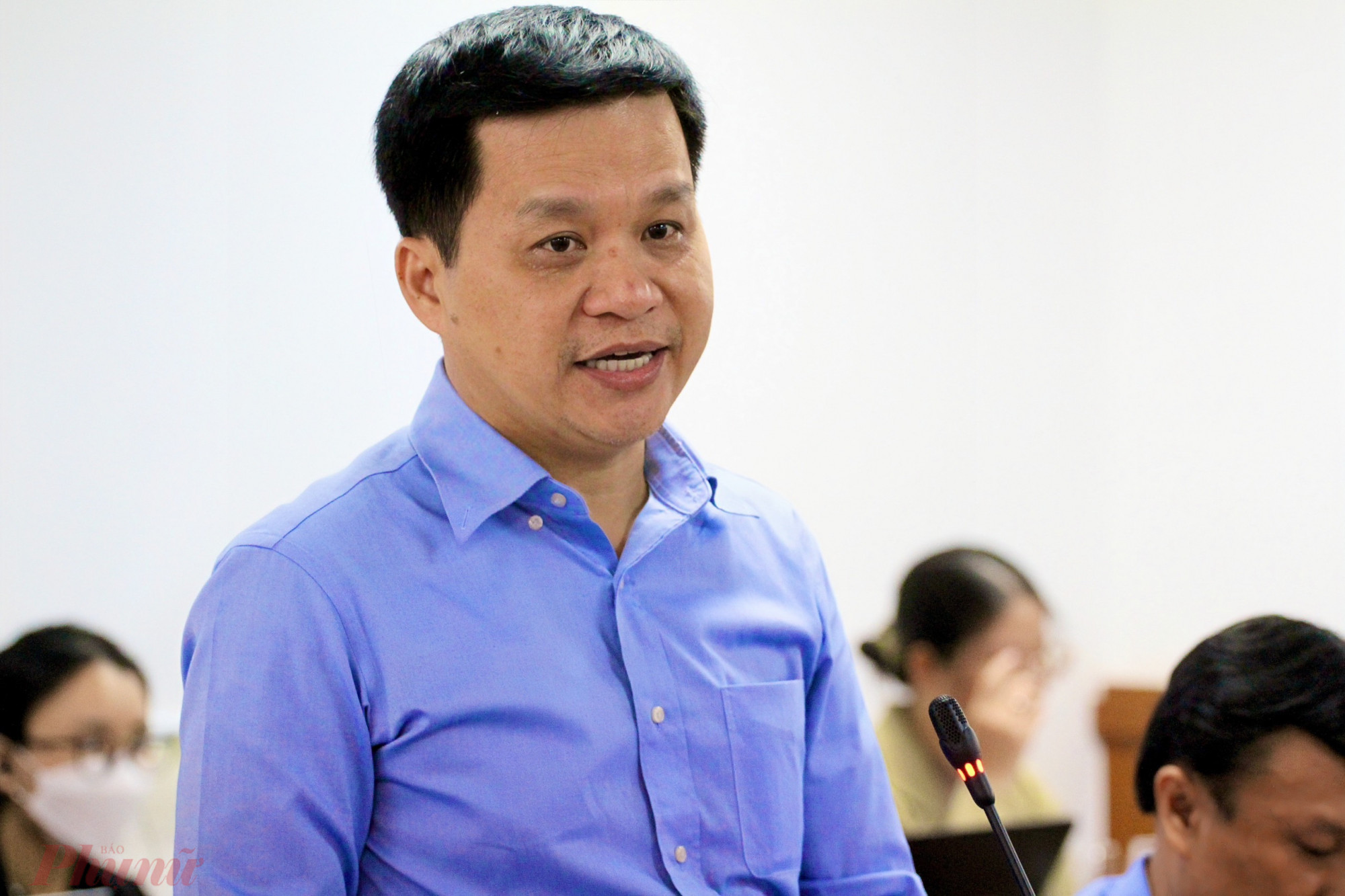 Ông Nguyễn Hồng Tâm - Giám đốc Trung tâm Kiểm soát bệnh tật TPHCM (HCDC) thông tin về các vấn đề liên quan dịch bệnh tay chân miệng và sốt xuất huyết trên địa bàn thành phố. Ảnh: TTBC