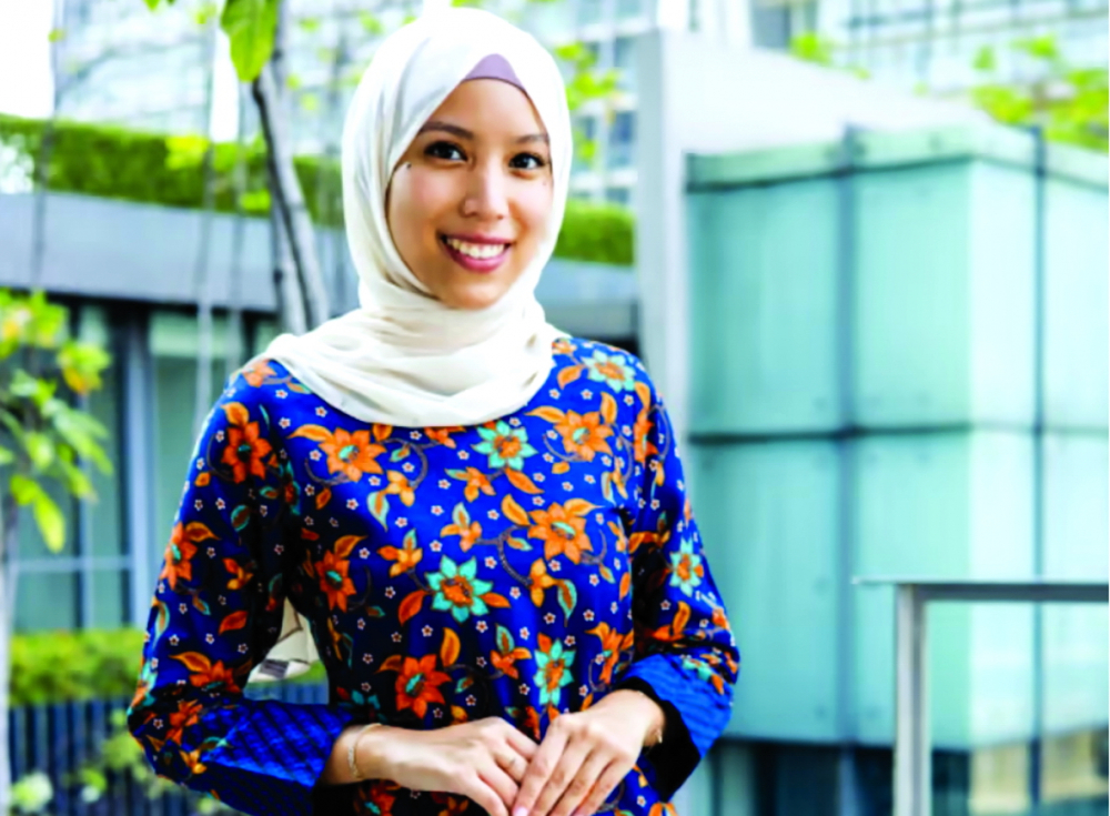 Aziza Aznizan đang tích cực giảng dạy và trao quyền cho các cộng đồng bị thiệt thòi ở Malaysia thông qua tổ chức phi chính phủ Paint The World - Nguồn ảnh: CNA