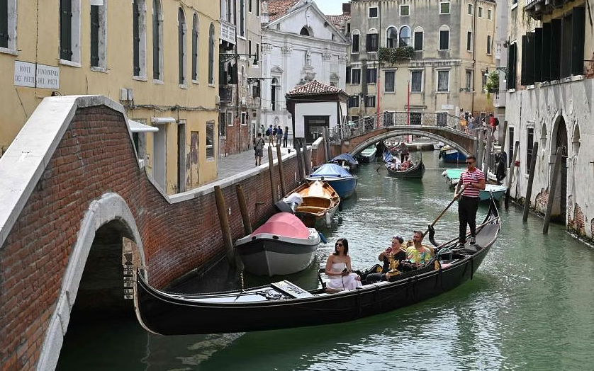 Venice UNESCO khuyến nghị đưa Venice vào danh sách di sản nguy cấpđang có nguy cơ bị loại khỏi danh sách của UNESCO. ẢNH: AFP