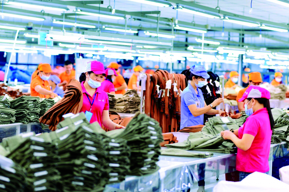 Một số doanh nghiệp dệt may có đơn hàng trở lại nhưng số lượng ít, lợi nhuận thấp nên ngại vay vốn - Ảnh: Hoa Lài (chụp tại Công ty may Sài Gòn 3)