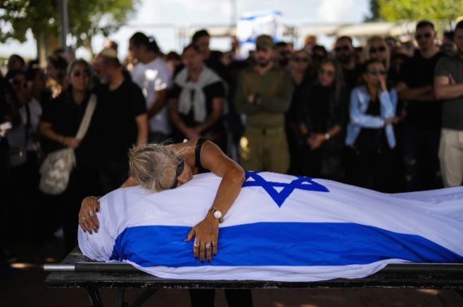 Hình ảnh mất mát, chết chóc và đau buồn ở cả Israel và Palestin khiến 