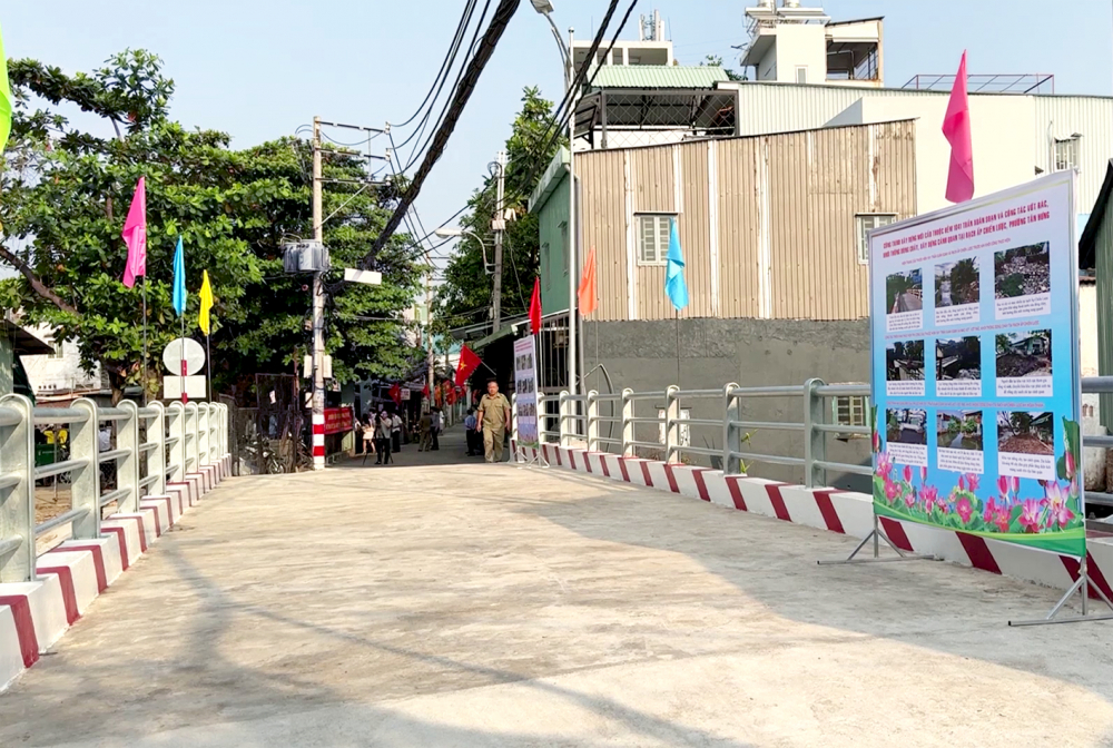 Cây cầu và đường hẻm 1041 Trần Xuân Soạn, phường Tân Hưng, quận 7 được mở rộng hoàn tất vào đầu năm 2024 nhờ sự đồng thuận của người dân