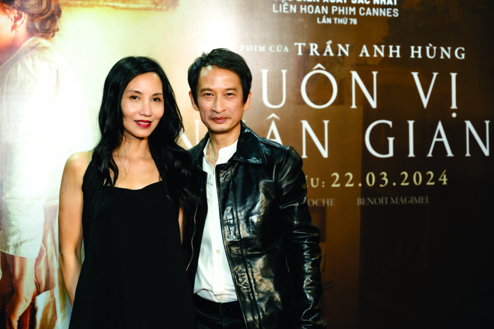 Vợ chồng Trần Nữ Yên Khê - Trần Anh Hùng tại buổi ra mắt phim Muôn vị nhân gian ở Việt Nam - Nguồn ảnh: CJ ENM