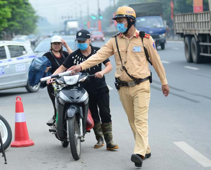 Theo quy định tại Luật Trật tự, an toàn giao thông đường bộ, tài xế vi phạm sẽ bị áp dụng hình thức trừ điểm thay vì tước giấy phép lái xe - Ảnh: C.P