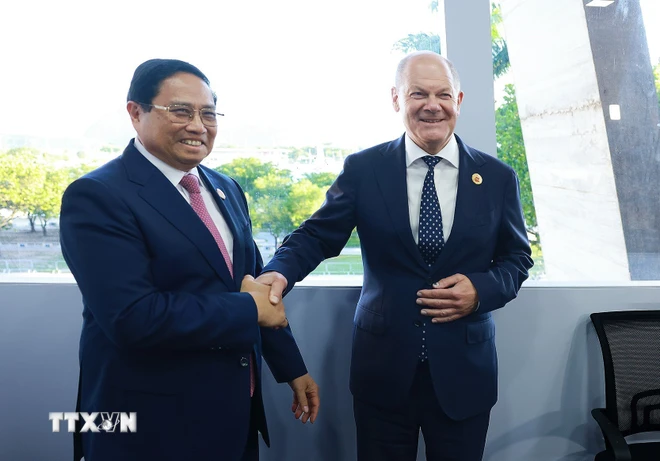 Thủ tướng Phạm Minh Chính gặp Thủ tướng Đức Olaf Scholz tại Hội nghị thượng đỉnh G20 - Ảnh: TTXVN