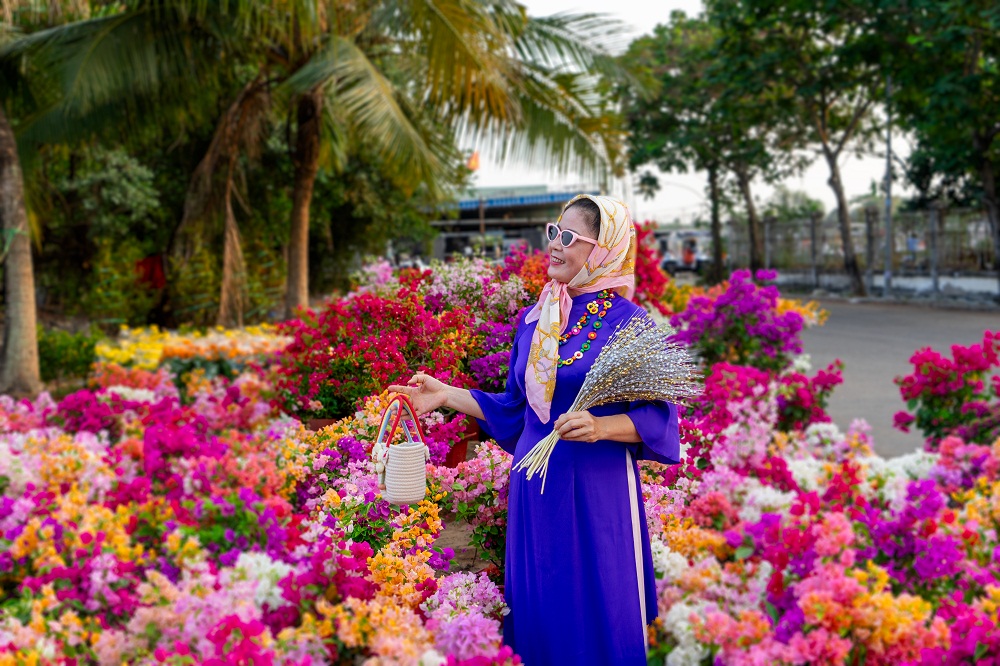 Chợ hoa xuân Bình Điền thể hiện trách nhiệm của doanh nghiệp với xã hội, sự chia sẻ với cộng đồng - Ảnh: SATRA