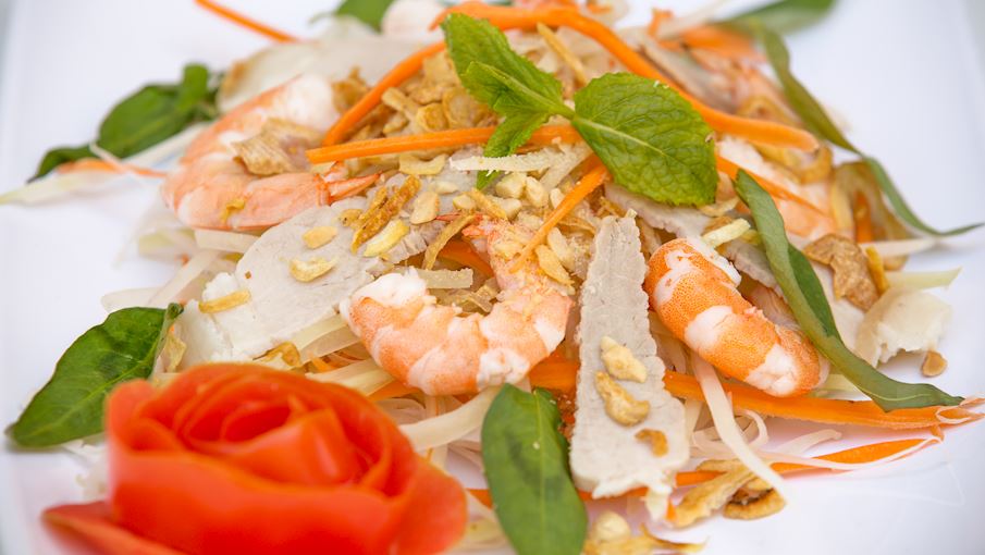 Nộm là một món salad truyền thống của Việt Nam. Món này được làm từ sự kết hợp của các loại rau tươi nạo như bắp cải và củ cải, cùng với đu đủ, xoài xanh, hoa chuối, dưa chuột thái lát, và đôi khi thậm chí là thịt lợn luộc xé nhỏ. Các thành phần phổ biến khác bao gồm ớt cay, hạt lạc rang và cà rốt nạo để làm cho món salad hấp dẫn hơn về mặt thị giác và nhiều màu sắc hơn.  Nộm là tên gọi ở miền Bắc, trong khi ở miền Nam, món gỏi được gọi là gỏi . Các món gỏi thường được chấm với nước chấm, và thường được ăn kèm với bánh phồng tôm.