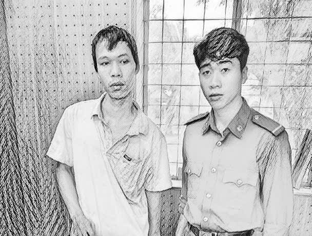 Đối tượng Đoàn Mai Khanh (bìa trái) tại cơ quan công an