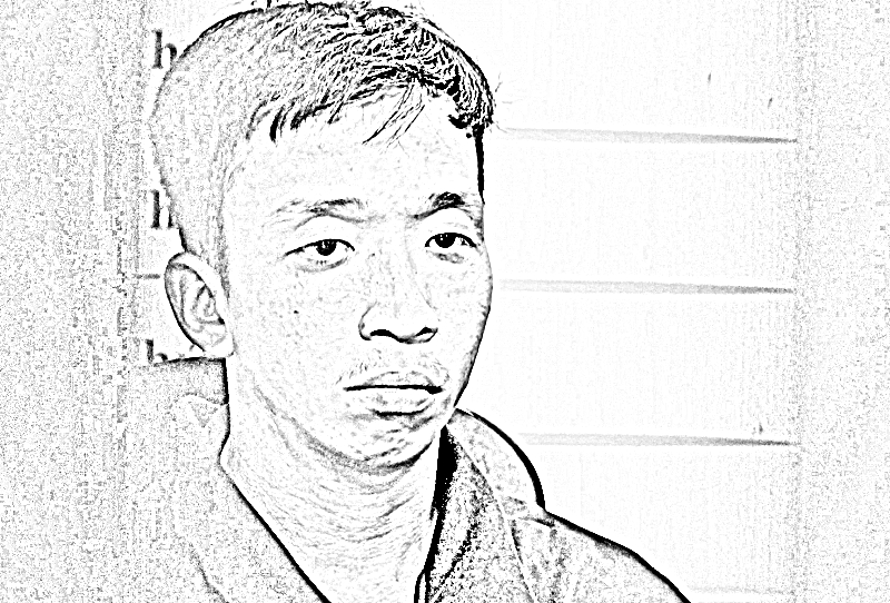 Đối tượng Lâm Văn Khanh tại cơ quan công an - Ảnh CACC