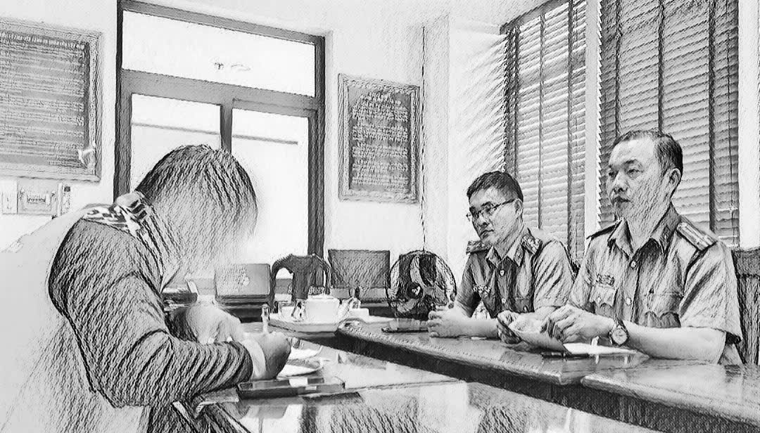 Cơ quan công an làm việc với ông N.V.Q_Ảnh: CACC