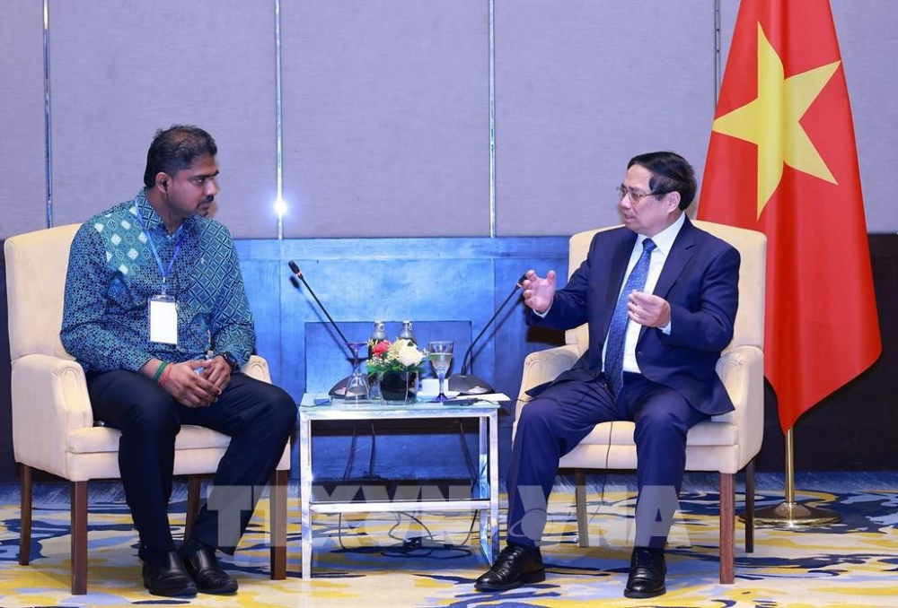 Thủ tướng Phạm Minh Chính làm việc với các doanh nghiệp hàng đầu Malaysia Thủ tướng Phạm Minh Chính tiếp Chủ tịch Phòng Thương mại và Công nghiệp Ấn Độ Kuala Lumpur và Selangor Nivas Ragavan. Ảnh: Dương Giang-TTXVN