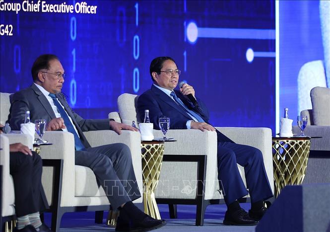 Thủ tướng Phạm Minh Chính phát biểu tại phiên thảo luận “Lưới thông minh kết nối thông qua hợp tác tự chủ AI” - Ảnh: TTXVN