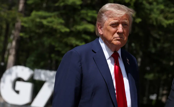 Ông Trump kêu gọi sơ tán khỏi Tehran và rời khỏi G7 sớm, với lý do khủng hoảng Trung Đông leo thang - Ảnh: AFP
