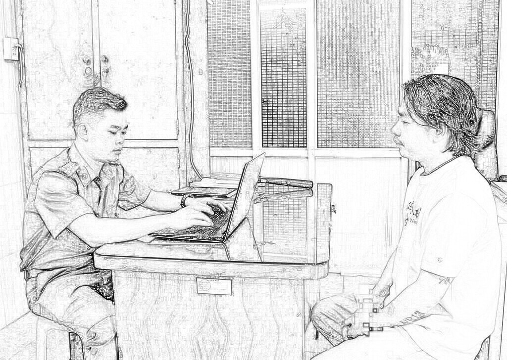Hoàng thời điểm tại cơ quan công an. Ảnh: CA