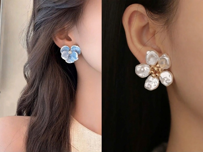 Bông tai hình hoa bản lớn là một trong những kiểu phụ kiện thường xuyên xuất hiện trong phong cách Hàn Quốc. Thiết kế này tạo điểm nhấn xinh xắn cho phần tai, bạn có thể kết hợp cùng kiểu tóc búi thấp, để xõa nhẹ đều tôn lên vẻ duyên dáng. Kiểu dáng này sẽ phù hợp với trang phục có chất liệu mềm rũ, mang lại sự nữ tính và cho bạn cảm giác năng động ngày hè.