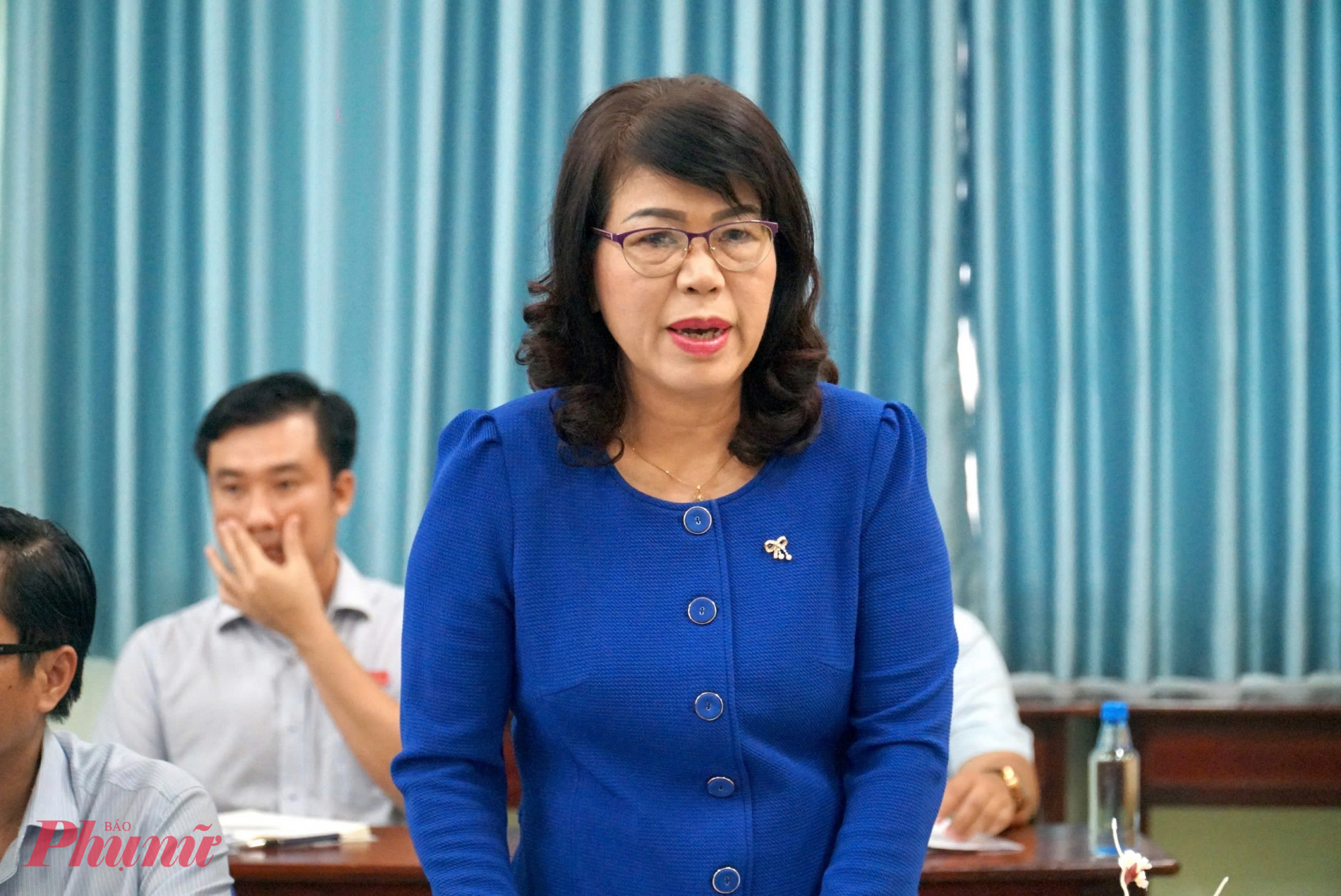 Bà Trương Lê Mỹ Ngọc - Bí thư Đảng uỷ - báo cáo kết quả vận hành bộ máy chính quyền 2 cấp tại phường Tân Sơn Hoà - Ảnh: Thanh Tâm 