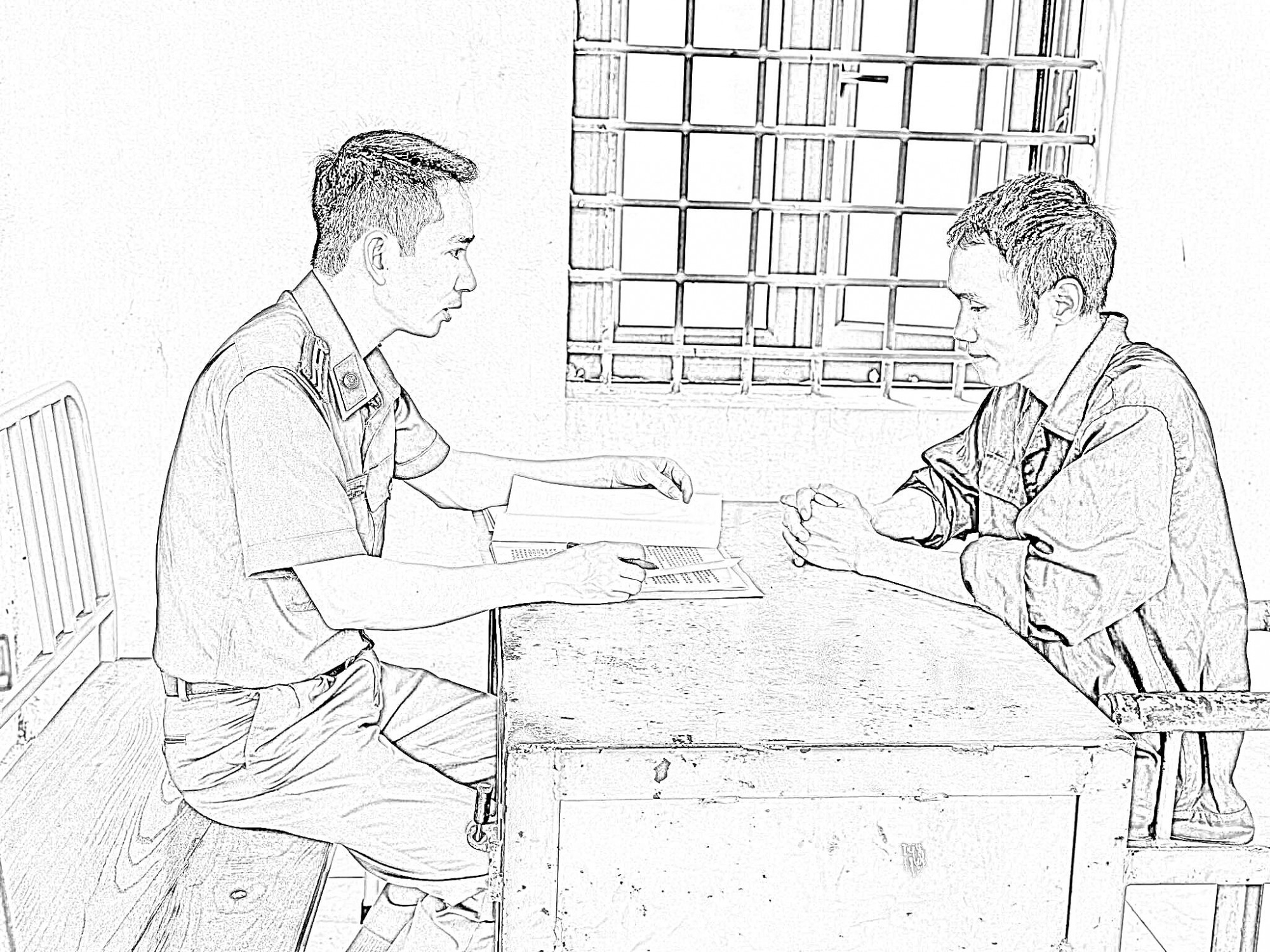 Bị can Trần Ngọc Bình tại cơ quan công an - Ảnh: CACC
