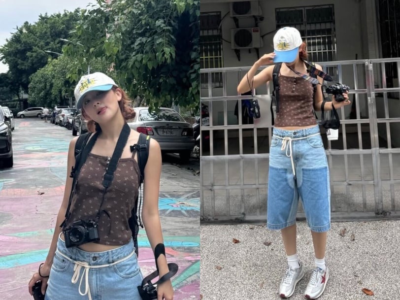 Seulgi (Red Velvet): Mỹ nhân Red Velvet chọn Jorts lửng phối mảng denim sáng - tối cùng áo tank top nâu và mũ lưỡi trai. Đôi giày sneaker trắng và chiếc túi đeo chéo nhỏ tạo cảm giác thoải mái, thích hợp cho du lịch hoặc chụp ảnh ngoài trời.
