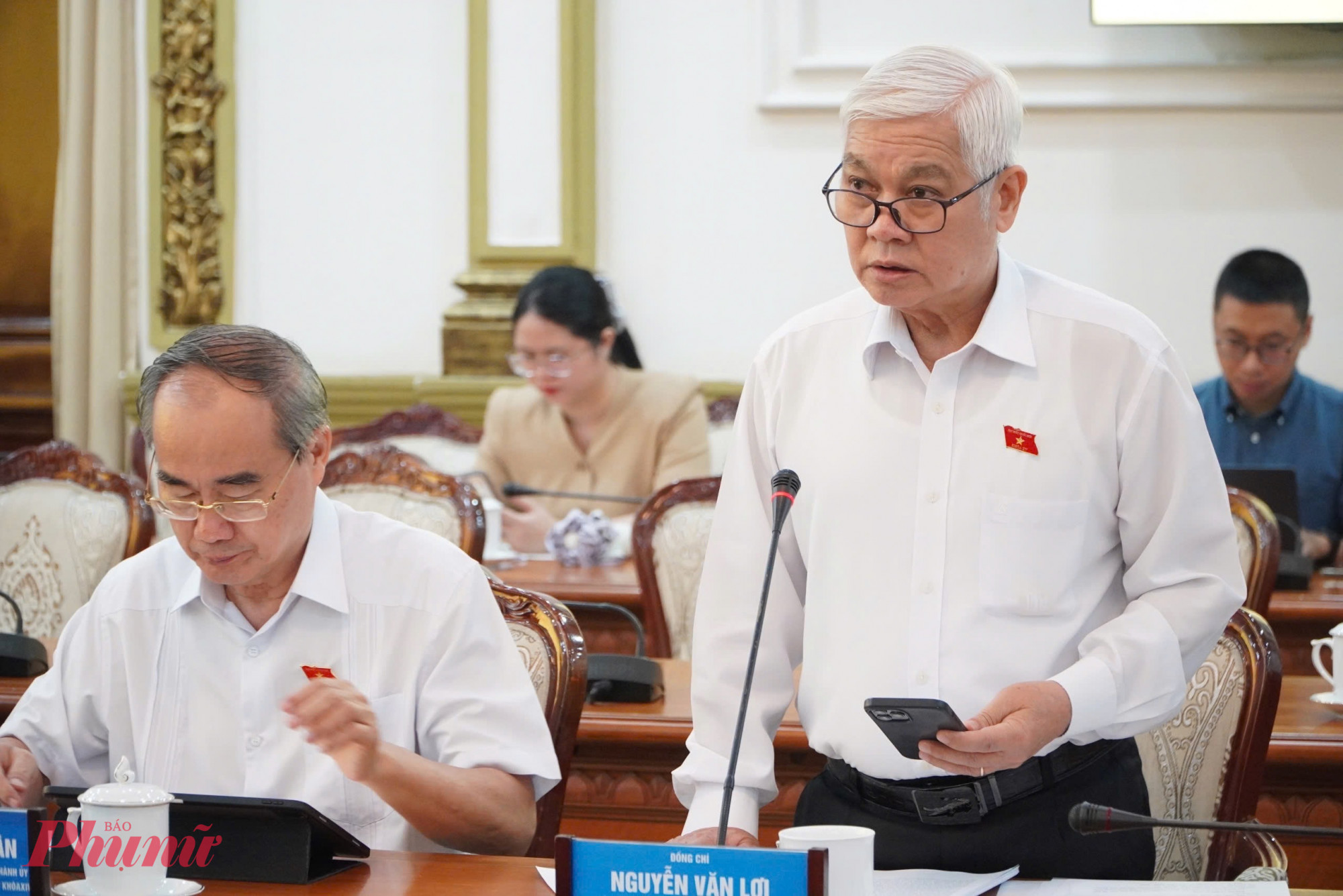 Ông Nguyễn Văn Lợi - Ủy viên Trung ương Đảng, Trưởng Đoàn ĐBQH TPHCM - phát biểu tại hội nghị - Ảnh: Thanh Tâm