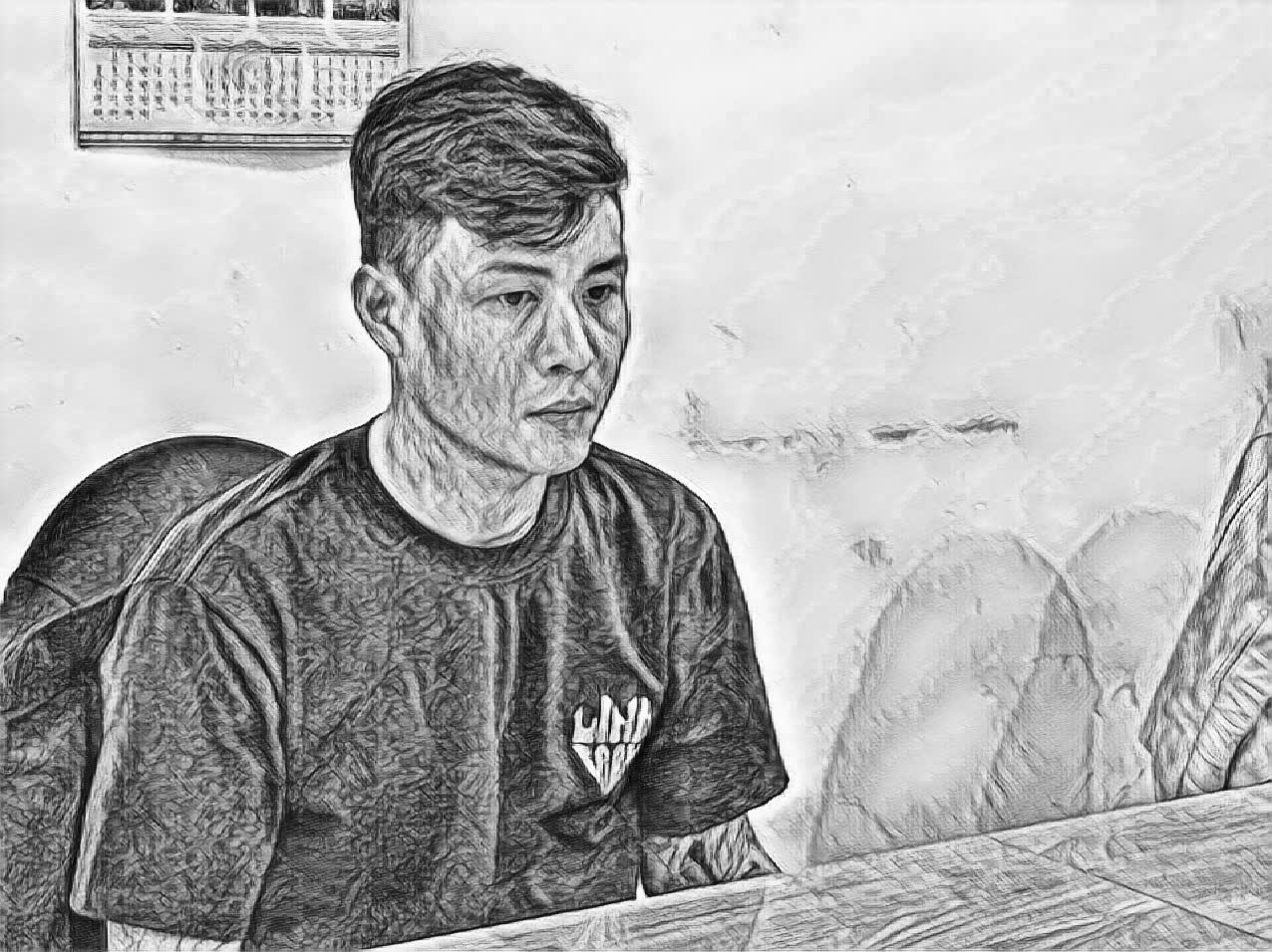 Đối tượng Trần Hồ Đỗ Tú tại cơ quan công an - Ảnh: S.Đ. 